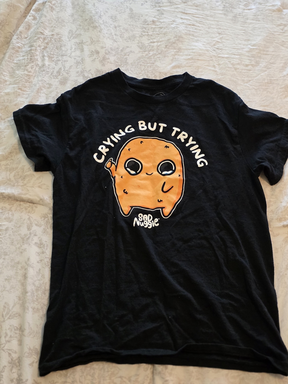 Crying But Trying Black Graphic Tee with Orange Character